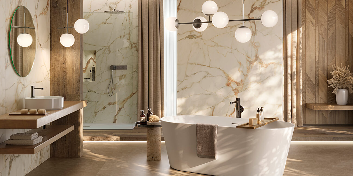 Baño contemporáneo de Porcelanosa con bañera exenta, revestimiento porcelánico efecto mármol y paneles de madera